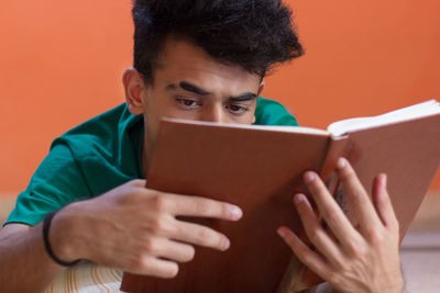 Portrait of boy using mobile phone