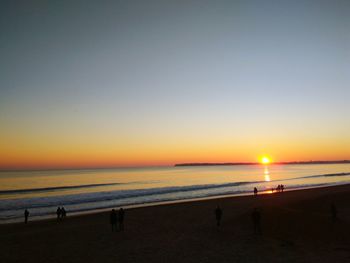 View of beach at sunset