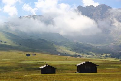 Scenic view of landscape and mountains against sky