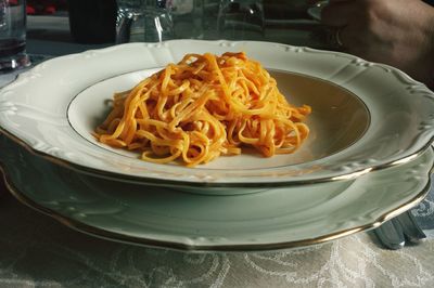 Close-up of noodles served in plate on table