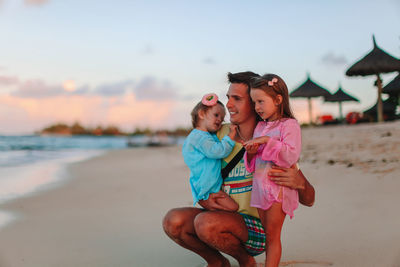 Couple kissing on beach