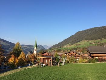 Scenic view of landscape against clear blue sky