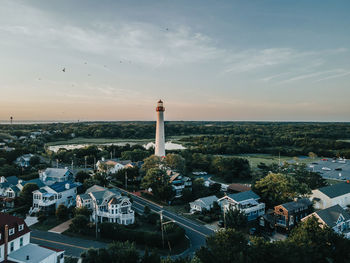 High angle view of lighthouse and buildings against sky. cape may new jersey lighthouse 