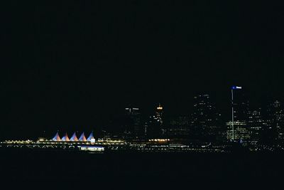 View of illuminated city at night