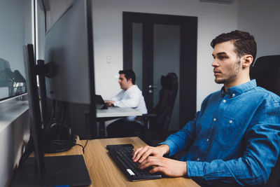 Man using laptop at home