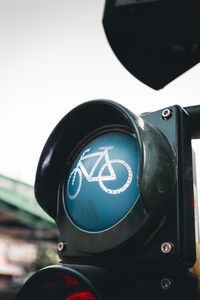 Close-up of information sign on road