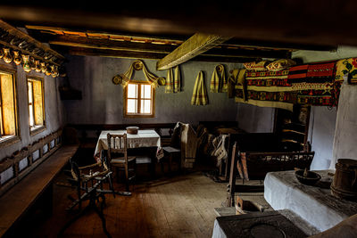 Traditional romanian folk house interior with rural furniture and decoration