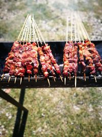 Close-up of meat on barbecue grill