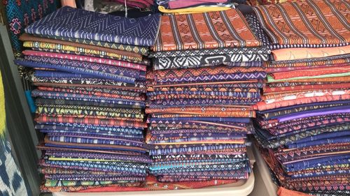 Full frame shot of multi colored for clothes for sale at market stall