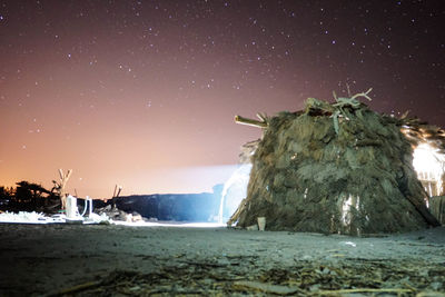 Scenic view of sea against sky at night