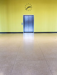 Yellow lamp on tiled floor