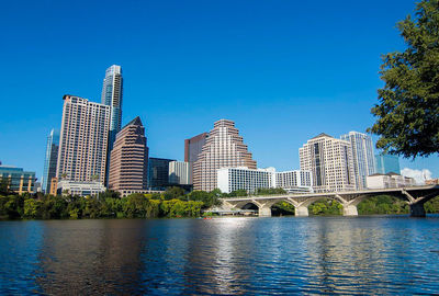 View of buildings against blue sky