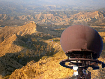 High angle view of communications tower and mountains