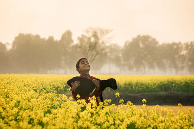 Woman standing in a field