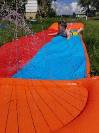 Full length of boy in swimming pool