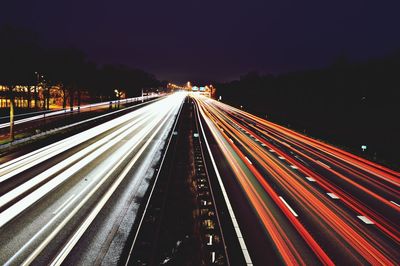 Light trails on road at night