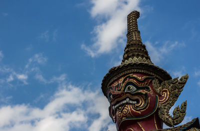 Low angle view of statue against sky