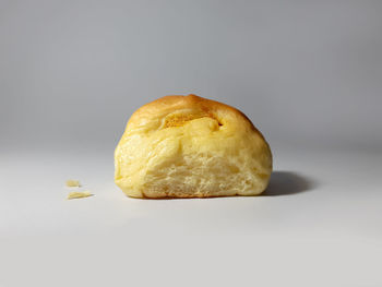 Close-up of lemon slice against white background