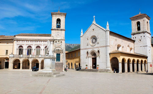 Facade of historic building against blue sky