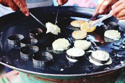 High angle view of person preparing food