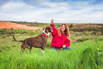 Portrait of a dog on field