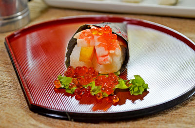 High angle view of sushi served in plate on table