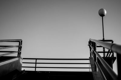 Low angle view of staircase against clear sky