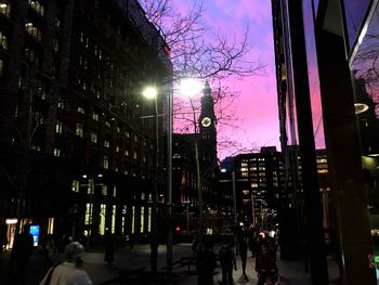 Buildings in city against sky