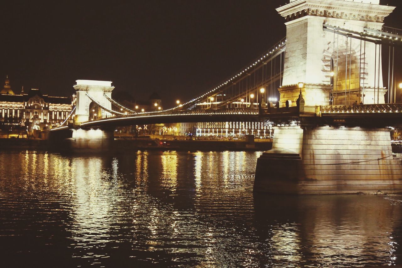 architecture, built structure, water, connection, bridge - man made structure, river, waterfront, reflection, building exterior, engineering, bridge, illuminated, city, travel destinations, famous place, arch bridge, night, transportation, arch, capital cities