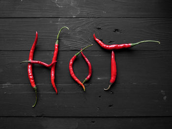 High angle view of red chili peppers on table