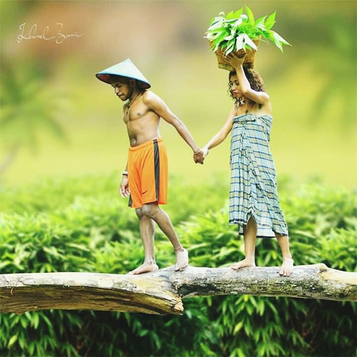 two people, plant, childhood, child, nature, togetherness, full length, standing, men, males, offspring, people, grass, boys, side view, day, casual clothing, women, holding, bonding, outdoors