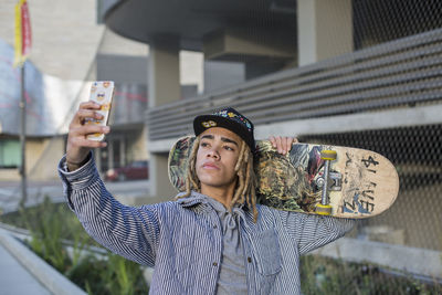 Young man and skateboard.