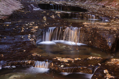 Scenic view of waterfall in forest