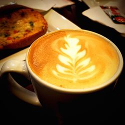 Close-up of cappuccino on table