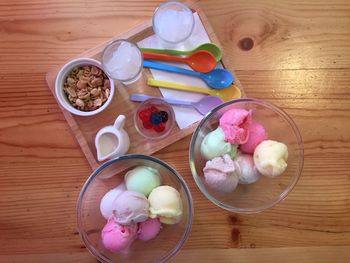 High angle view of multi colored candies on table