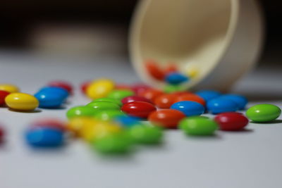 Close-up of multi colored balls on table