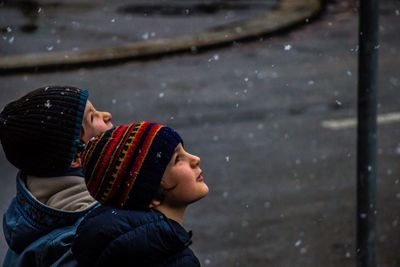 Boys looking at snow