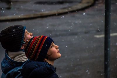 Boys looking at snow