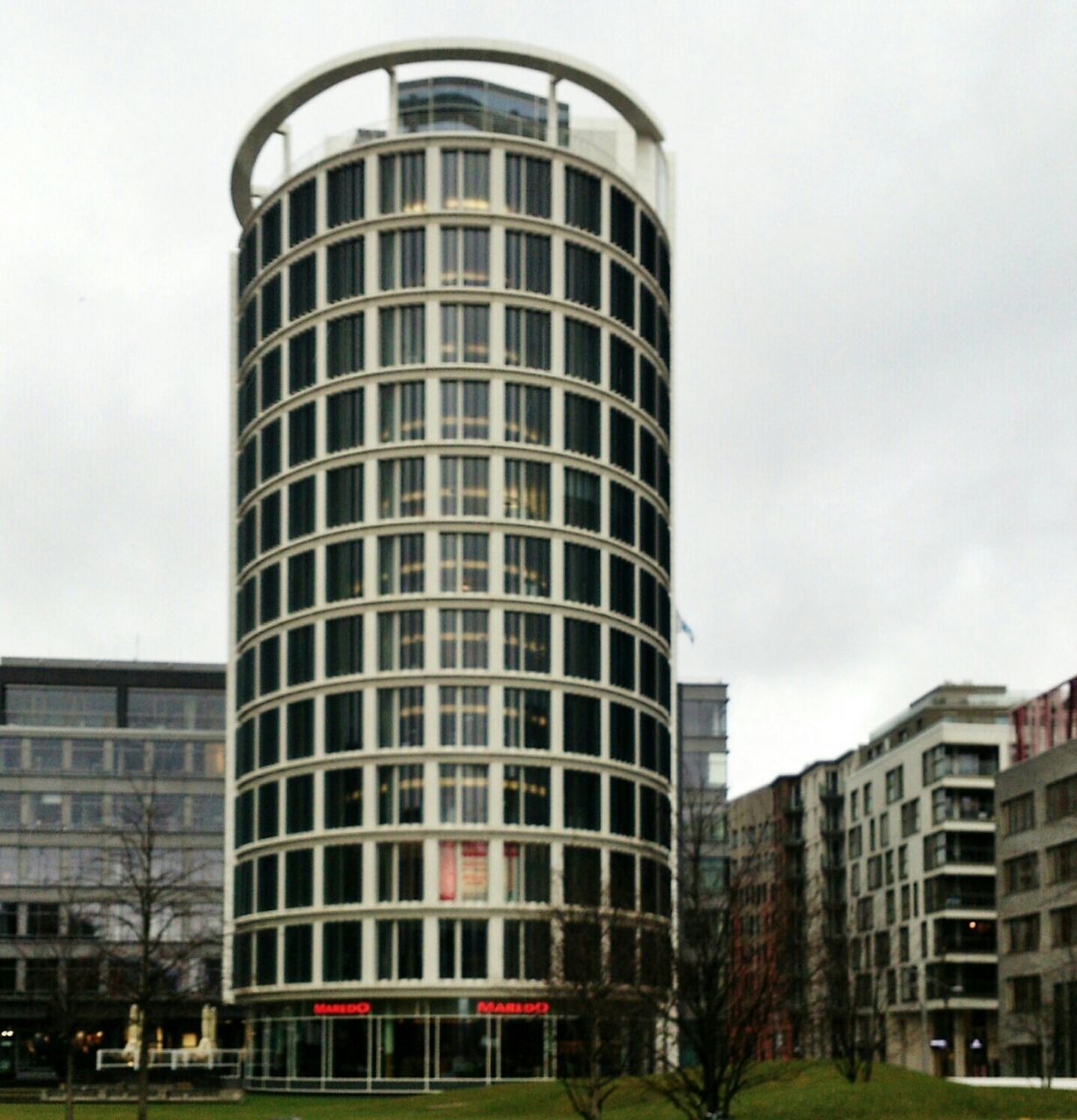 building exterior, architecture, built structure, low angle view, modern, city, building, sky, office building, window, tall - high, glass - material, tower, day, outdoors, skyscraper, no people, exterior, residential building, development