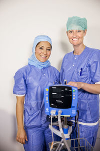 Smiling nurses working together