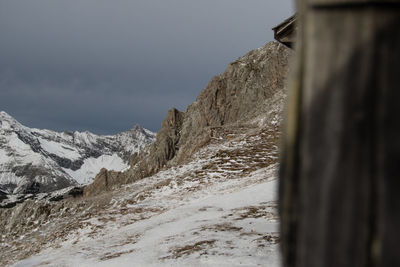 Snow covered mountain against sky