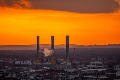 Cityscape against sky during sunset