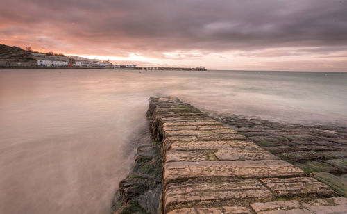 Scenic view of sea against sky during sunset