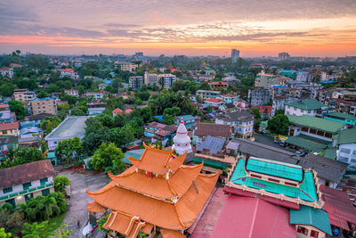 High angle view of townscape against sky during sunset