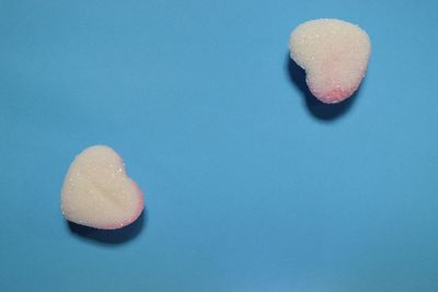 Close-up of heart shape against blue background