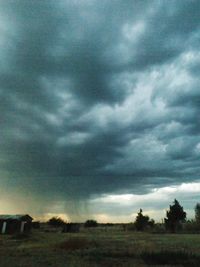 Scenic view of dramatic sky over landscape