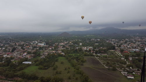 Aerial view of cityscape against sky