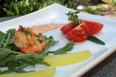 Seafood in plate on table