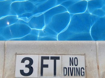 High angle view of text on swimming pool