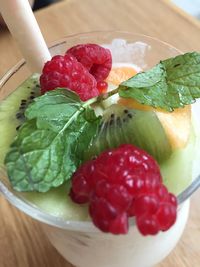 Close-up of strawberries in plate on table